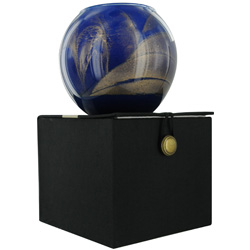 COBALT CANDLE GLOBE by Cobalt Candle Globe THE INSIDE OF THIS 4 in POLISHED GLOBE IS PAINTED WITH WAX TO CREATE SWIRLS OF GOLD AND RICH HUES AND COMES IN A SATIN COVERED GIFT BOX. CANDLE IS FILLED WITH A TRANSLUCENT WAX AND SCENTED WITH MYSTERIA. BURNS AP