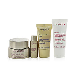 Clarins by Clarins Nutri-Lumiere Collection: Day Cream 50ml+ Night Cream 15ml+ Treatment Essence 10ml+ Hand & Nail Treatment Cream 30ml+ Bag -4pcs+1bag for WOMEN